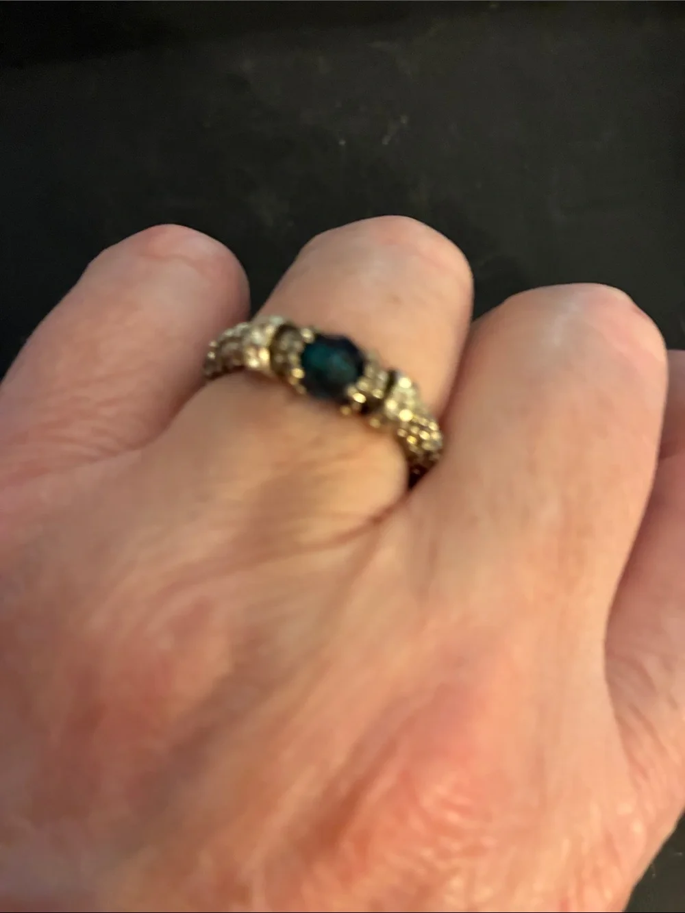 Gold-Tone Stretch Ring with Dark Blue Oval Stone and Pavé Accents.  NWOT